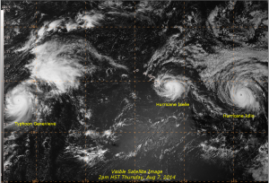 Visible satellite image showing Hurricanes Iselle and Julio in the Central Pacific and Typhoon Genevieve just west of the dateline. Image taken 2pm HST Thursday, August 7, 2014.